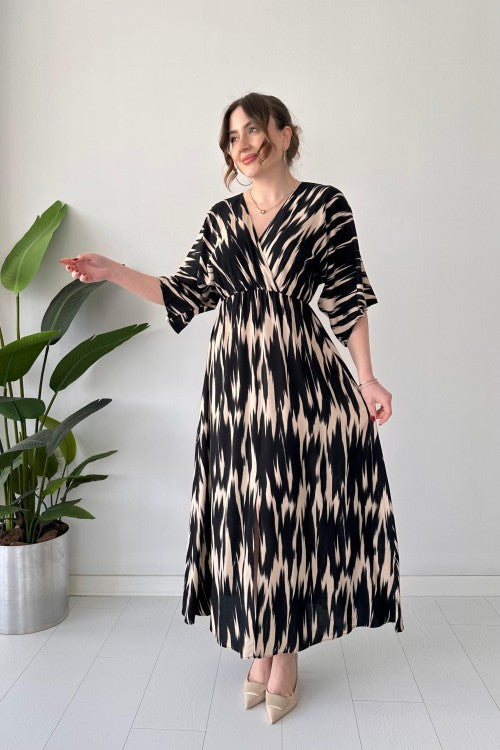 Robe chauve-souris noire à motif vague