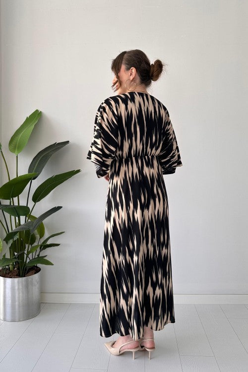Robe chauve-souris noire à motif vague