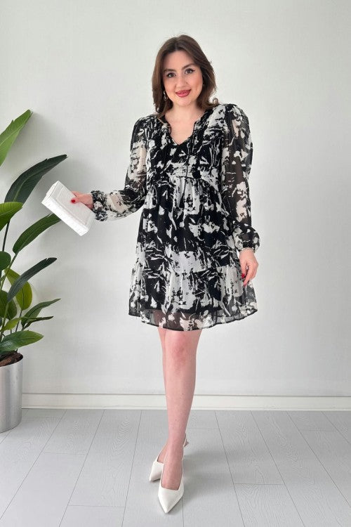 Robe fluide en mousseline noire