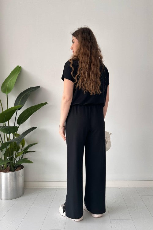 Costume en modal à boutons dorés noir