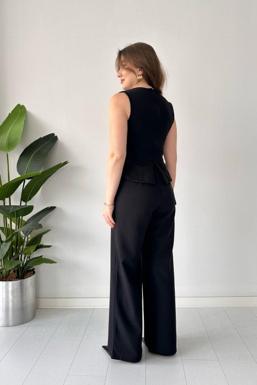 Combinaison boutonnée dorée noire