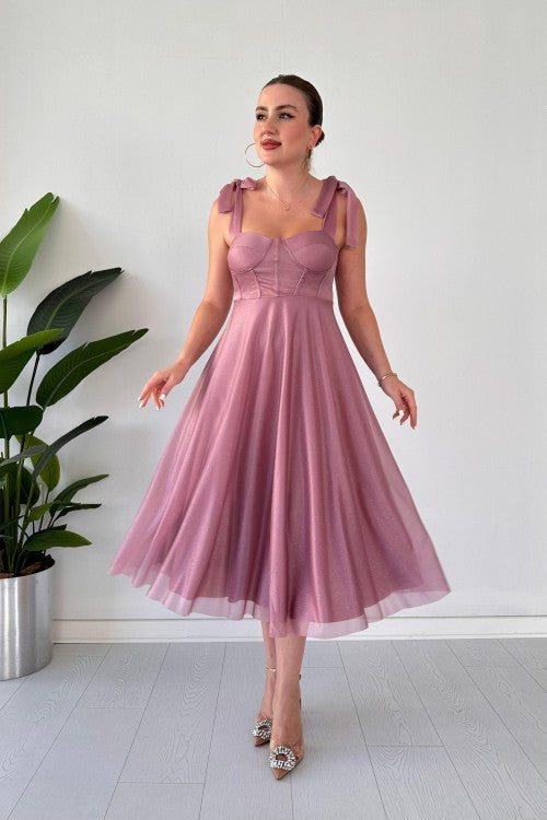 Robe de soirée évasée pailletée rose poudré