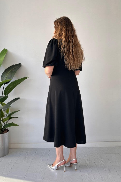 Robe en crêpe noire à trois nœuds